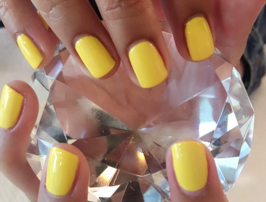 spa mini manicure yellow nails