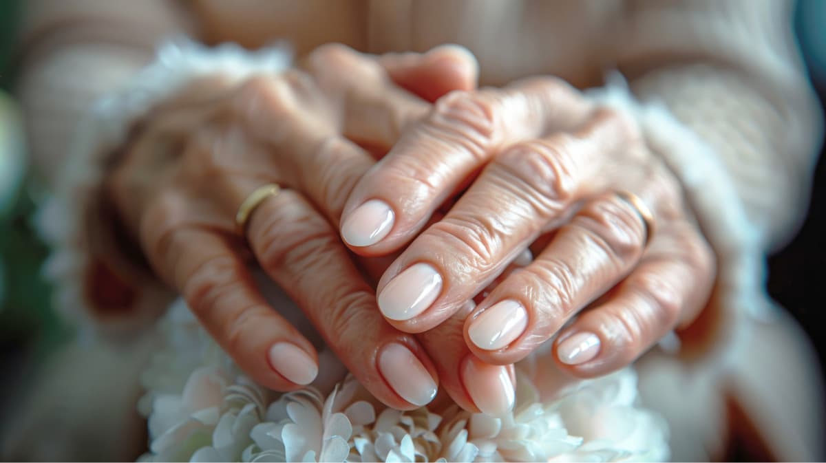 hands of an elderly lady after manicure